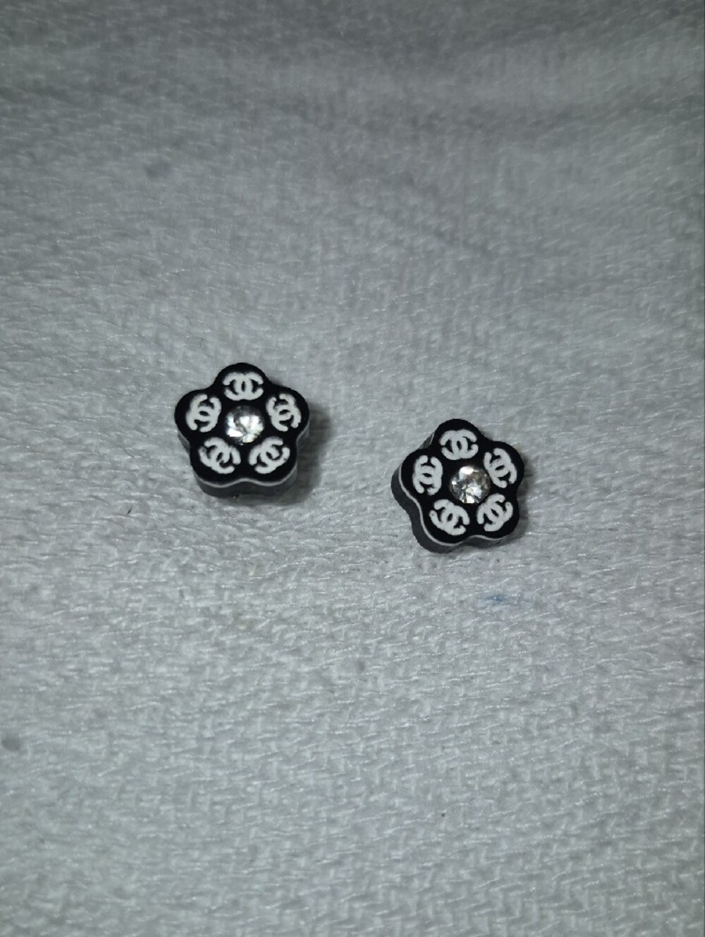​Black & White Flower Logo Stud Earrings